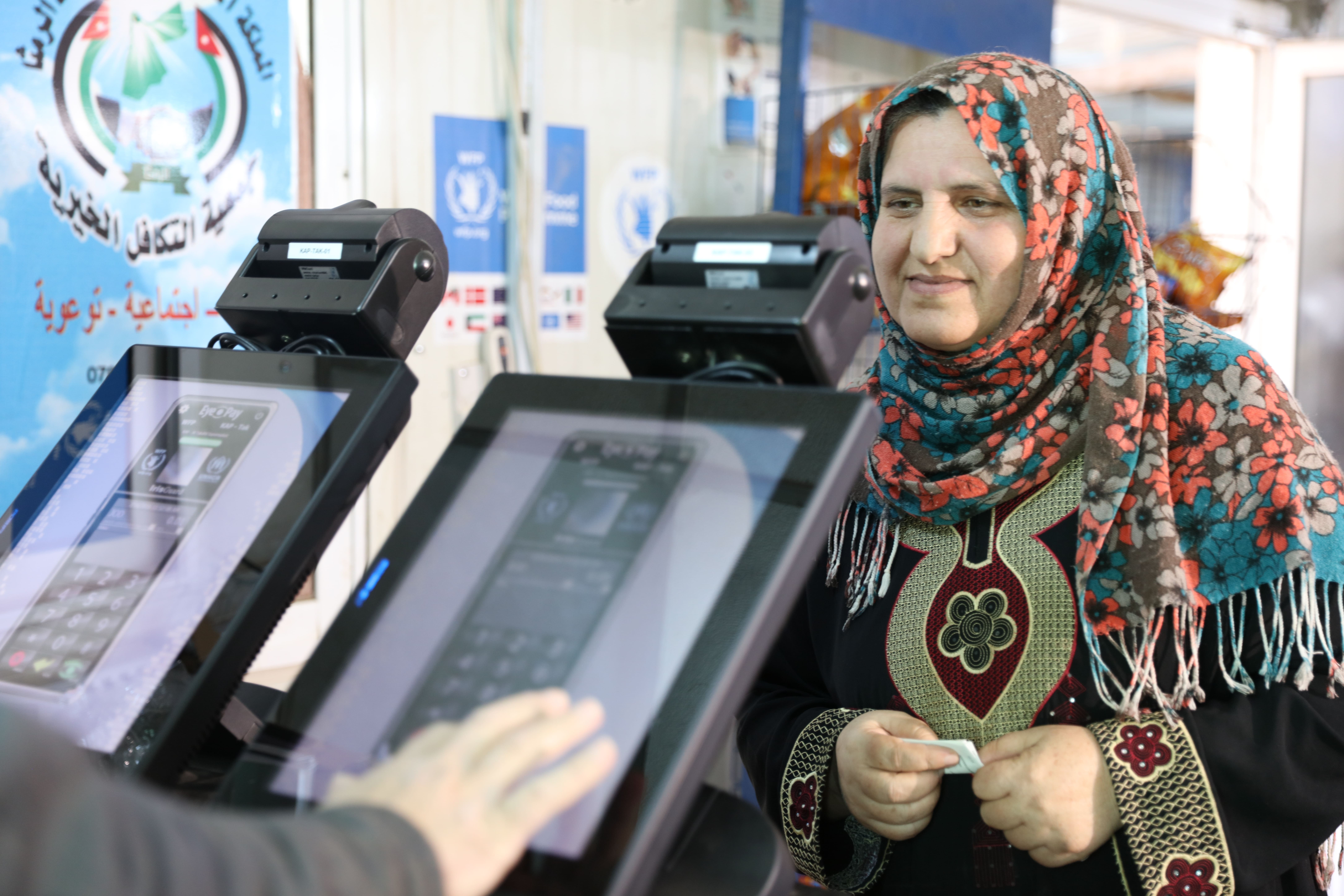 WFP provides food vouchers so Syrian refugees can purchase food