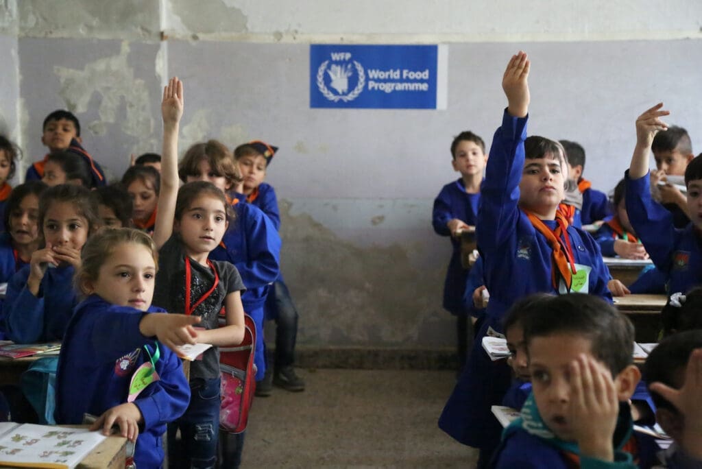 Syrian students are pictured in a classroom 