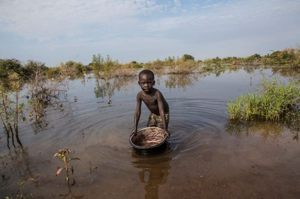 Climate change causes hunger by affecting crops, such as this flood in South Sudan