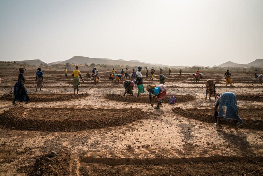 In famine-prone regions like South Sudan, holes are dug to conserve rainwater