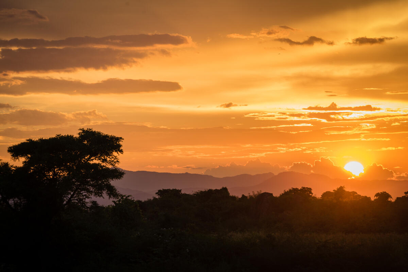 Sunset over landscape in Malawi, prone to droughts and floods