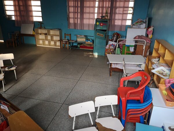empty classroom with chairs and toys