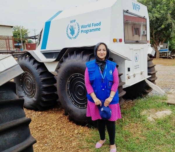 woman standing in front of WFP ATV